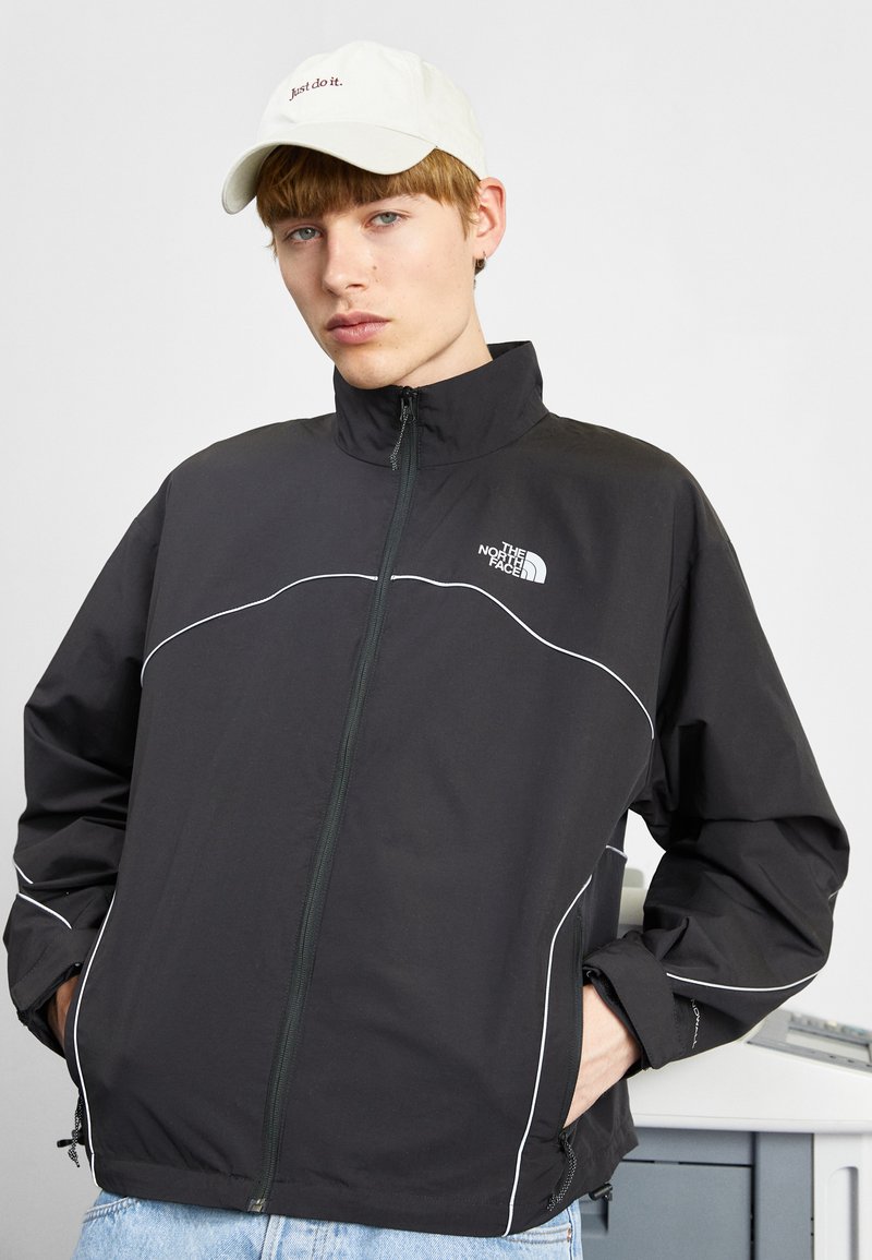 All black north face windbreaker Clearance