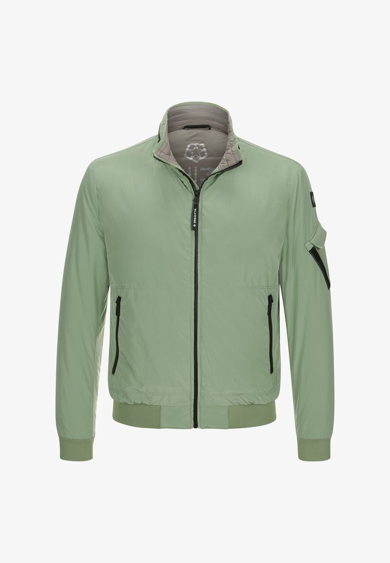 Hellgrüne Bomberjacke mit hohem Kragen, Reißverschluss und schwarzen Reißverschlussakzenten; verfügt über Seiten- und Taschenärmel. Glatte Textur.