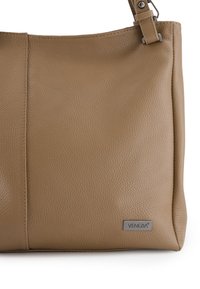 Brown leather handbag with a textured finish, a rectangular shape, and a logo plaque. Features a single shoulder strap and a zipper closure.
