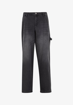 Schwarze Jeans im Relaxed Fit mit Knopfverschluss, Gürtelschlaufen und einer Seitentasche. Glatte Textur mit ausgeblichenen Details.