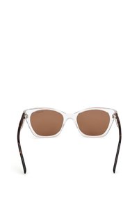 Lunettei ilman kehystä, joissa on ruskeat polarisoidut linssit, kissankorva-muodolla ja kilpikonnakuosiset koristeet tempuilla.