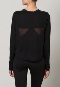 Reebok Långärmad tröja - black