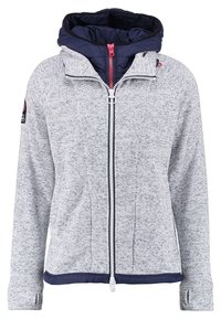 Grå zip-up-jacka med marinblå vadderad huva, tumhål på ärmarna och marinblå kant i nederkanten.