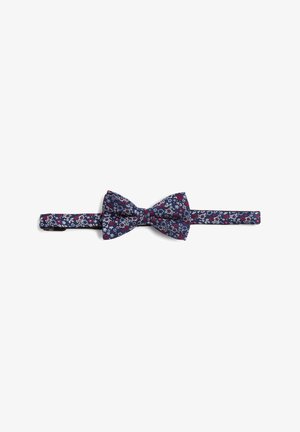 Floral patterned bow tie in navy blue fabric with red and white accents, featuring a pre-tied design and adjustable strap.