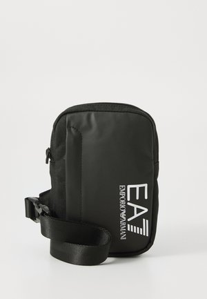 TRAIN CORE U MINI POUCH BAG UNISEX - Cross body bag - black beauty