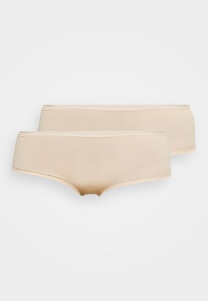 Beige naadloze ondergoed, met een gladde textuur, middenhoogte pasvorm en geen zichtbare naden, geleverd in een verpakking van twee.