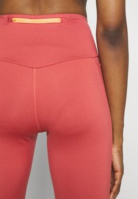 Puma FIRST MILE 7/8 - Tights - astro red