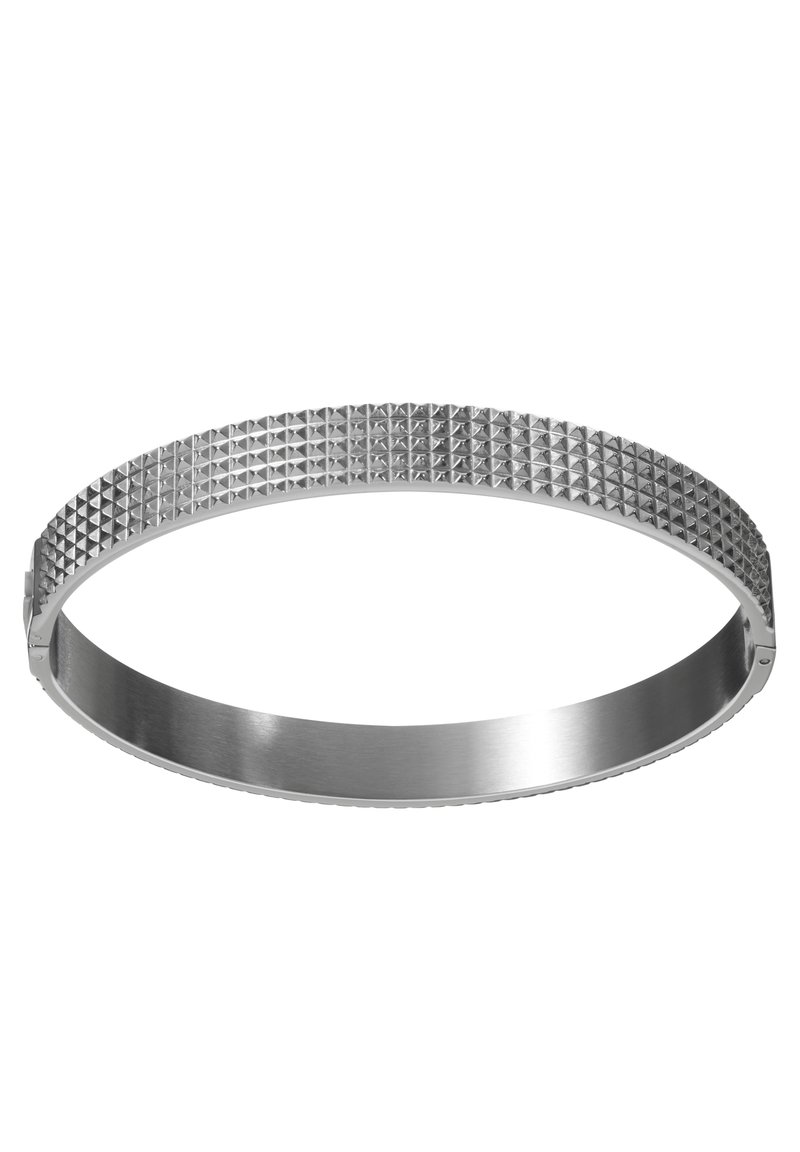 Silver metallic bangle bracelet with a flat, smooth surface and textured sides featuring a series of small pyramidal studs.