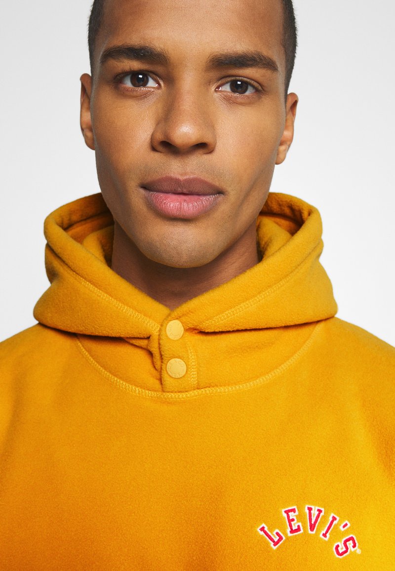 Levi's® HOODIE UNISEX - Hoodie - golden yellow/dark yellow - Zalando.de