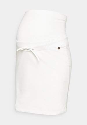 Saia de maternidade branca com uma cintura dobrada, detalhe de cordão e um sutil acento metálico de lado, feita de um tecido macio e elástico.