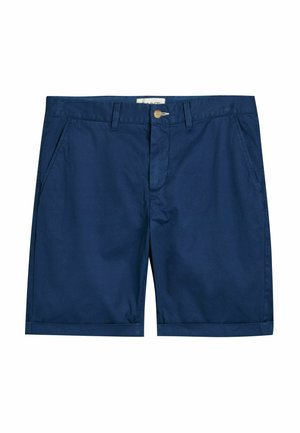 Pantalones cortos de algodón azul marino con cierre de botón, bolsillos laterales y dobladillo doblado. Textura suave con un diseño de ajuste clásico.