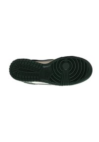 Scarpa Nike con una suola in gomma nera strutturata, caratterizzata da un motivo circolare e scanalature profonde per una migliore aderenza. Parte superiore di colore chiaro visibile ai bordi.