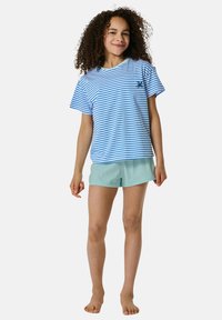 Striped blue and white short-sleeve t-shirt paired with mint green shorts. Features a relaxed cut and subtle logo on the shirt.