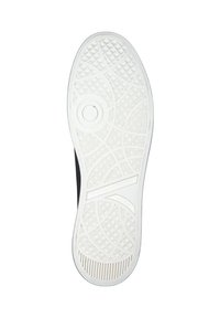 White rubber sneaker sole with a textured pattern, circular logo detail, and diagonal grooves for traction. Size marking visible.