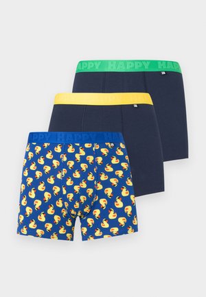 Drei Paar Herren-Boxershorts, zwei in Marineblau mit grünen und gelben Bund, eines in Blau mit gelbem Entenmuster und blauem Bund, alle mit der Aufschrift "HAPPY".