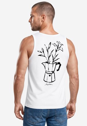 Man wearing white sleeveless shirt with black line drawing of a coffee maker vase holding flowers on the back.