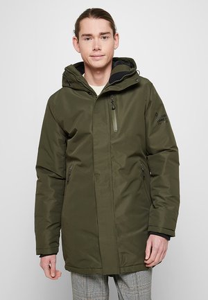 Green waterproof parka with a zippered chest pocket, adjustable hood, and two side pockets. Features a smooth texture and warm lining.