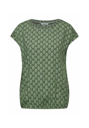 Blouse verte à manches courtes avec un motif floral vert clair sur l'ensemble du tissu et un col rond.