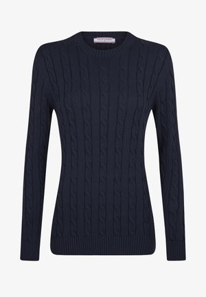 Tume sinise värvi nööridega kudum, millel on pikad varrukad, ümmargune kaelus ning soonikkoes mansetid ja alläär. Omab tekstuurset mustrit ja pehmet, paksu materjali.