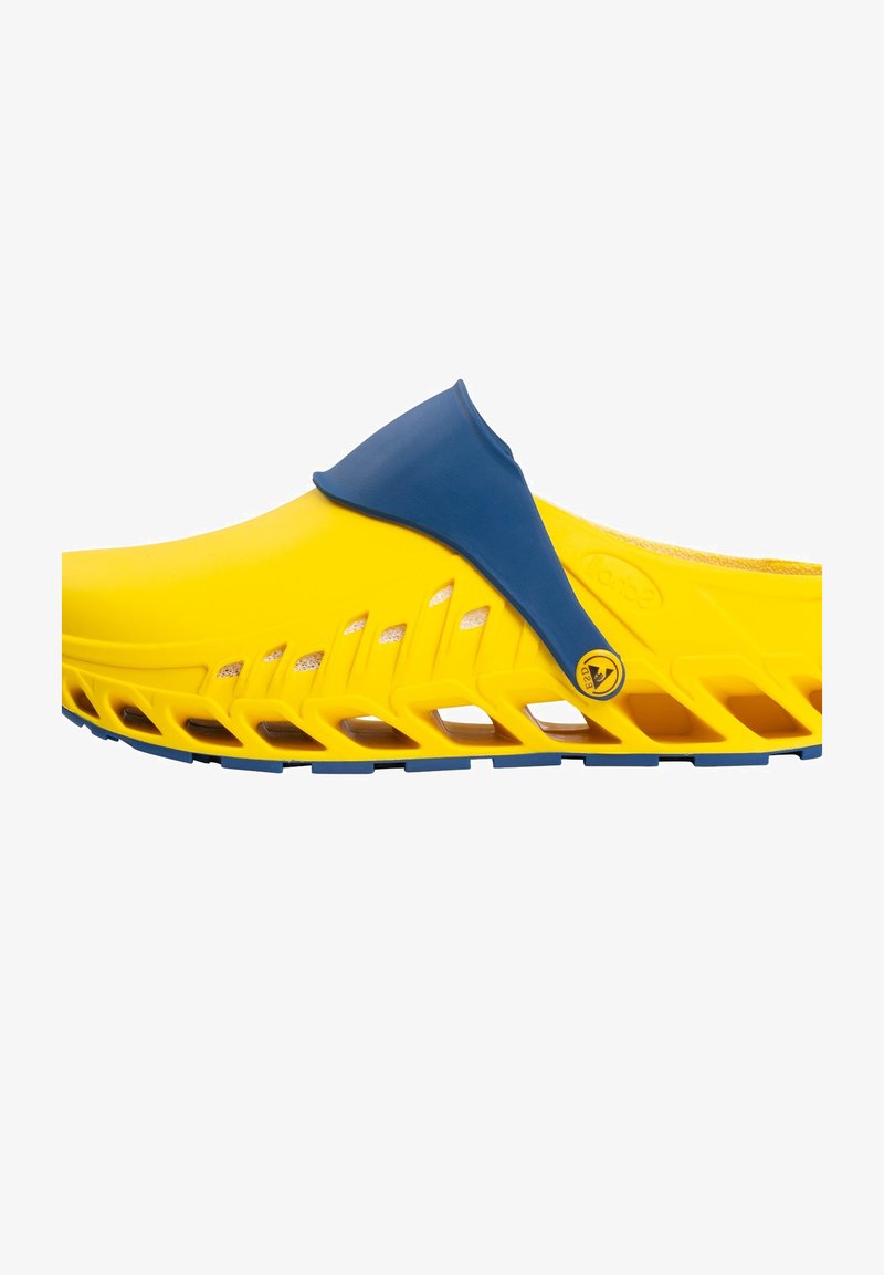 Yellow slip-on clog with blue strap, featuring a textured design, open side slits for ventilation, and a rubber sole with cutouts.