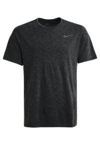 Czarny T-shirt Dri-FIT z melanżowym wzorem, krótki rękaw, okrągły dekolt i małe, odbite logo marki na górnej lewej części klatki piersiowej.