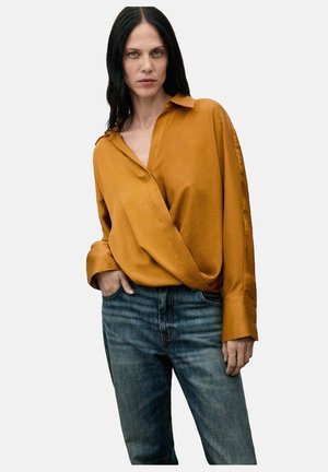 Blusa - mustard yellow