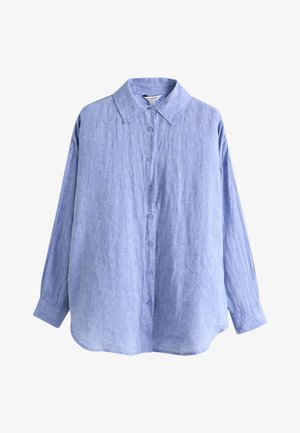 Chemise bleu clair à manches longues avec boutons et col pointu, en tissu texturé, présentée sur fond blanc.