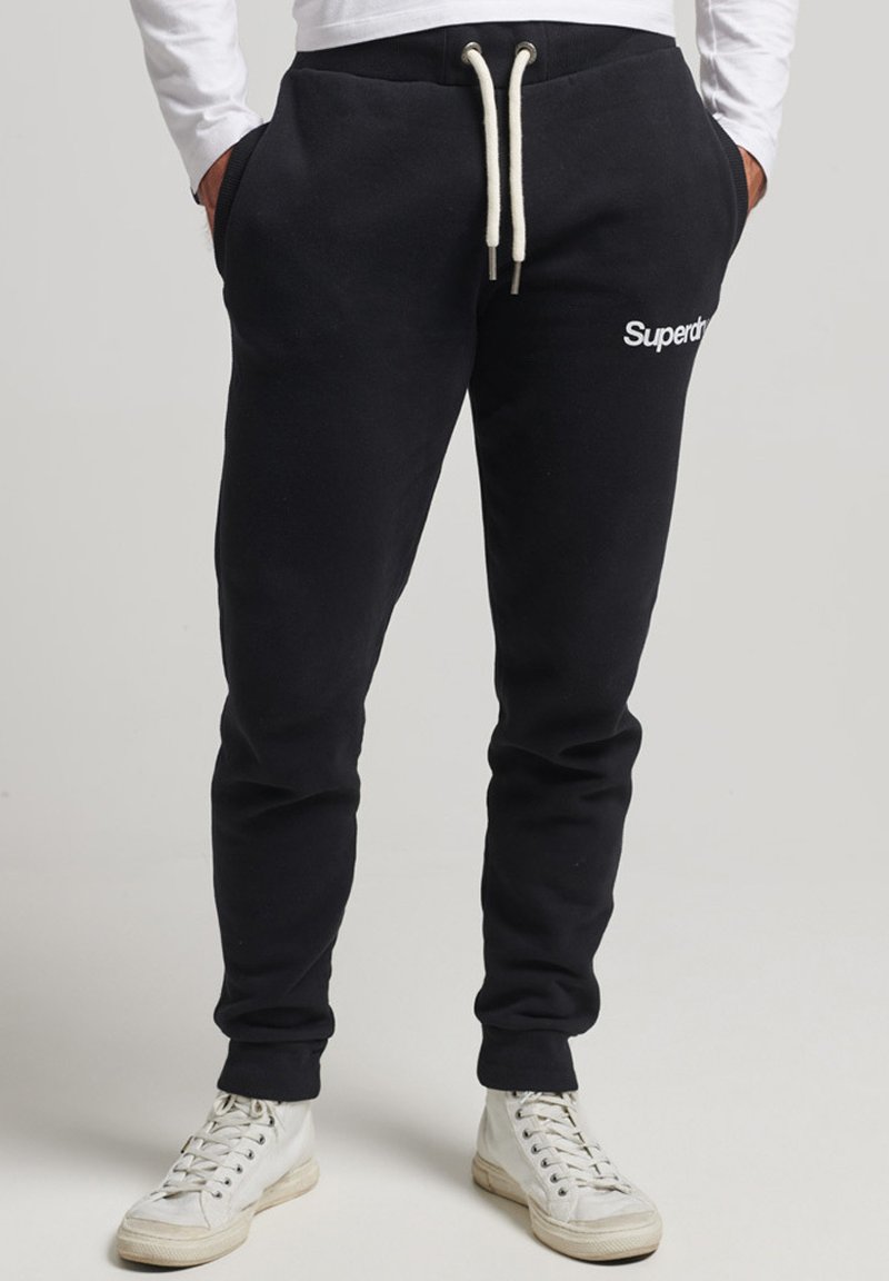 Superdry CORE LOGO GRAPHIC Tracksuit bottoms black Zalando.co.uk