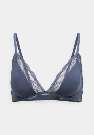 Navy blue lace bralette with soft cups, adjustable straps, and a simple band. Features sheer lace trim and smooth fabric for comfort.