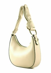 Sac à main en cuir couleur crème, avec une silhouette incurvée, une anse nouée et des éléments métalliques dorés soulignés par des coutures noires le long des bords.