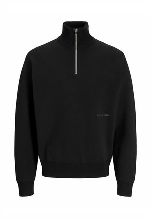 Stickad tröja - black
