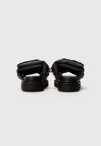 Toga Mules - black