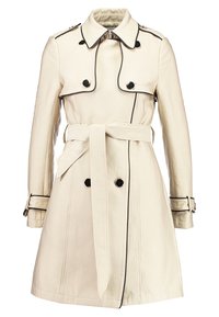 Beżowy płaszcz typu trencz wykonany z tkaniny z czarnym obszyciem, dwurzędowymi guzikami, paskiem i zaokrąglonym kołnierzem. Posiada długie rękawy i boczne kieszenie.