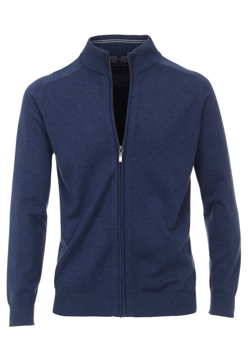 Mörkblå zip-up kofta med hög krage, tillverkad av ett mjukt stickat material. Har ribbade ärmslut och nederkant med minimala detaljer.