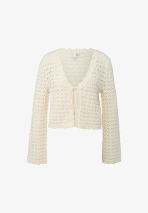 Cremekleurige gehaakte cardigan met geschulpte randen, lange mouwen, V-hals en vooraan met een strik sluiting.