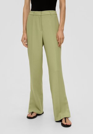 Pantalons taille haute vert clair, au design ajusté, à jambes larges et à texture lisse. Comprend des plis verticaux et des poches latérales.
