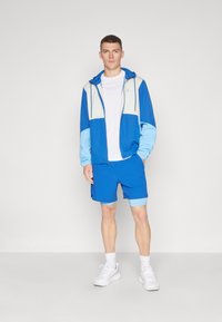 Under Armour LEGACY  - Tuulejope - tech blue/horizon blue