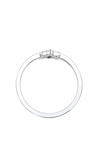 Sølv metalring med en glat, cirkulær band; har en sløjfeformet detalje øverst. Højglansfinishen fremhæver glansen og detaljen.