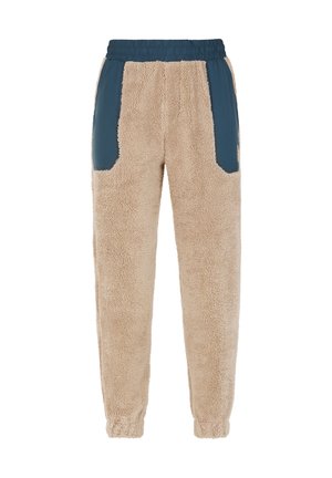 Beige fleece joggers med blå nylon sidepaneler og elastisk talje. Har lommepuder og elastiske manchetter ved ankle.