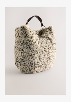 Faux fur bag with a beige and brown spotted pattern, featuring a rounded shape and dark leather strap with gold hardware accents.