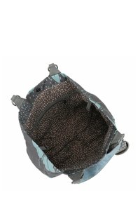 Borsa tote in tessuto multicolore con motivi floreali, particolari grigi, tasca interna con zip e rivestimento marrone a pois. Vista superiore, che mostra l'interno della borsa.