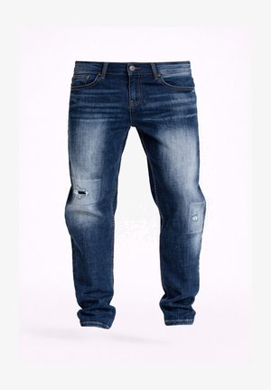 Mørkeblå slidte denimjeans med et slankt fit, der har let slid og små revner på lårene og knæene.