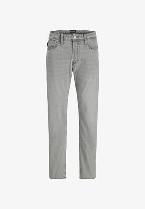 Hallikud teksad sirge lõikega, nupuvajutuse sulgemine ja viis taskut. Omab peent õmblemist ja klassikalist vöökoha disaini.