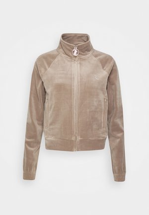 Fluwelen zip-up jas in lichtbeige, met raglanmouwen, een opstaande kraag en een logoprint op de borst. Zachte textuur, getailleerd ontwerp.