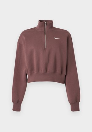 Afgeknotte bordeauxrode sweatshirt met een hoge kraag, halve rits en geribbelde boorden. Voorzien van een wit Nike-logo op de linkerborst. Zachte stof.