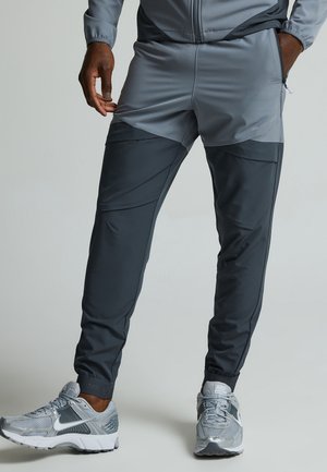 Monterrain, VAULT WOVEN RUNNING PANT - Kalhoty - iron gate night owl purple heather