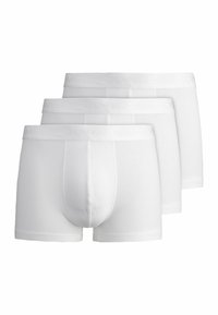 Tre paia di boxer bianchi in cotone con una morbida vita elastica che presenta il nome del marchio impresso. Texture liscia e design aderente.