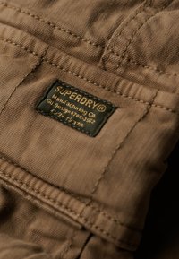 Superdry & Co - Bojówki