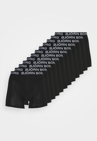 Schwarze Boxershorts aus weichem Stoff mit einem breiten elastischen Bund, auf dem "BJÖRN BORG" steht, angeordnet in einem Stapel.