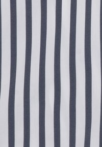 Striped fabric with alternating navy blue and white vertical lines. The texture appears smooth, with a lightweight, airy quality.
